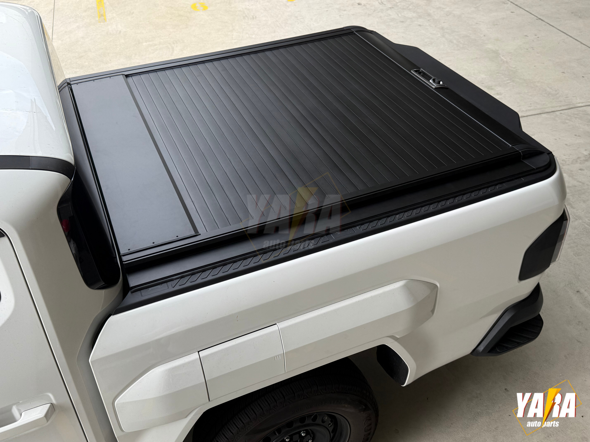 Kia Tasman Manual Roller Shutter | Lockable Aluminium Hard Lid (2025+)